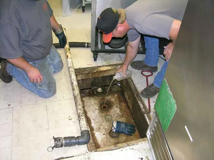A problem grease trap being treated. Routine use of FOG-Pro can reduce costly service calls.