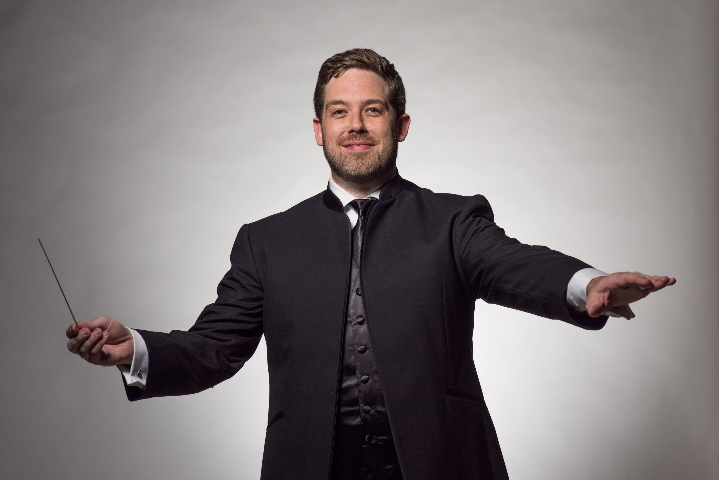 Brett Mitchell led the Sarasota Music Festival Orchestra in works of Stravinsky and Mozart at the Sarasota Opera House on Saturday, June 17. (Photo by Peter Lockley)