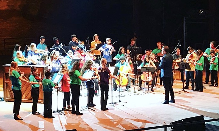 Brett Mitchell leads Yo-Yo Ma and El Sistema Colorado in of Bach's Air on a G String at Red Rocks Amphitheater in Morrison, CO. (Photo by Jose Mena)
