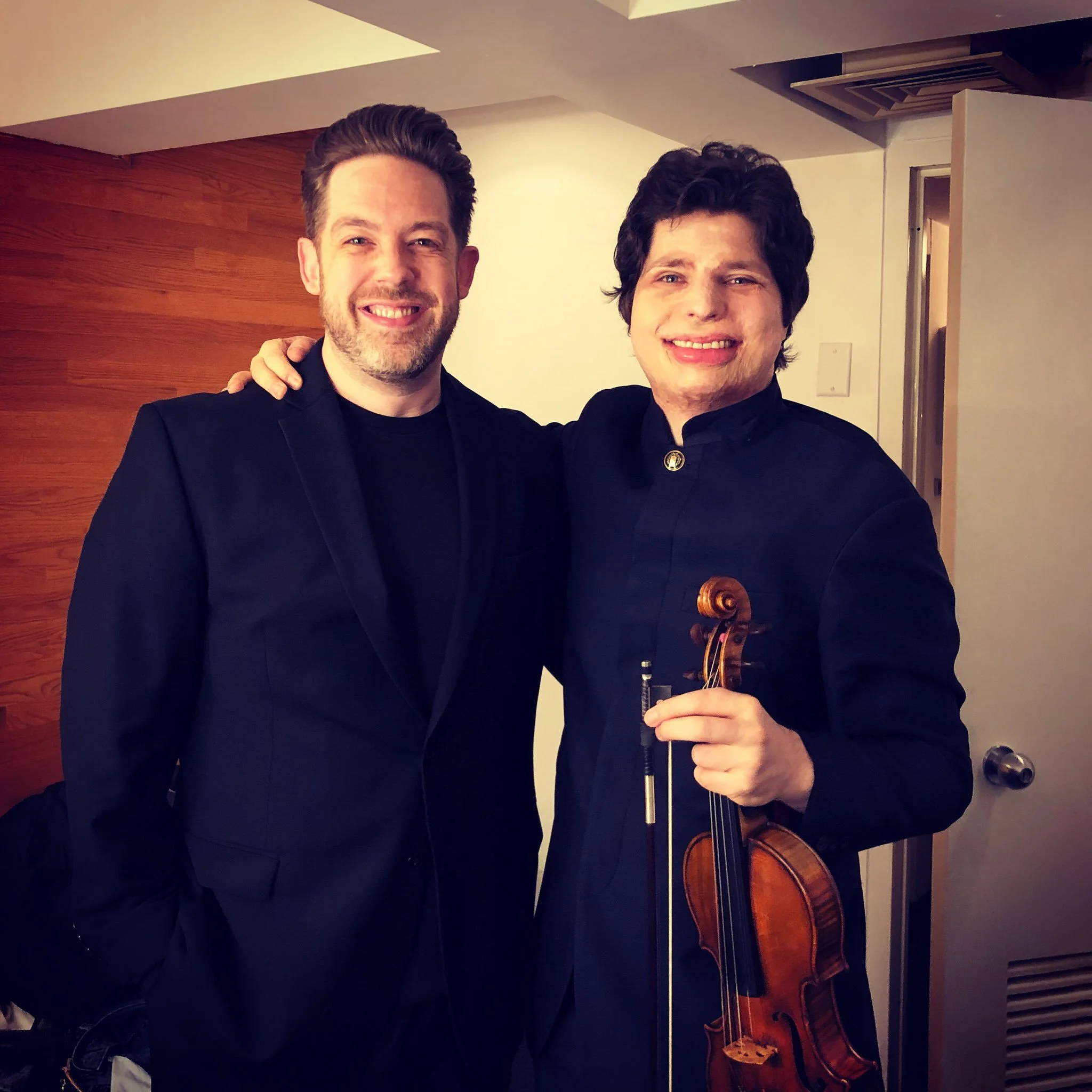 With violinist Augustin Hadelich after performing the Barber Violin Concerto with the Colorado Symphony.Boettcher Concert Hall, March 2019