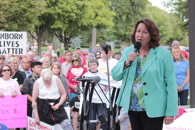 Sue Thayer, former director at Planned Parenthood Iowa speaks to #FirestormMN crowd, 9.9.15