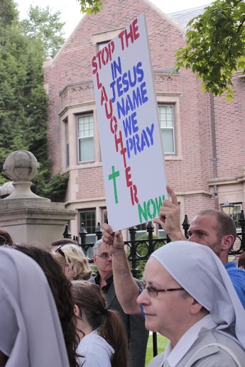 "Stop the Slaughter Now, in Jesus Name We Pray"