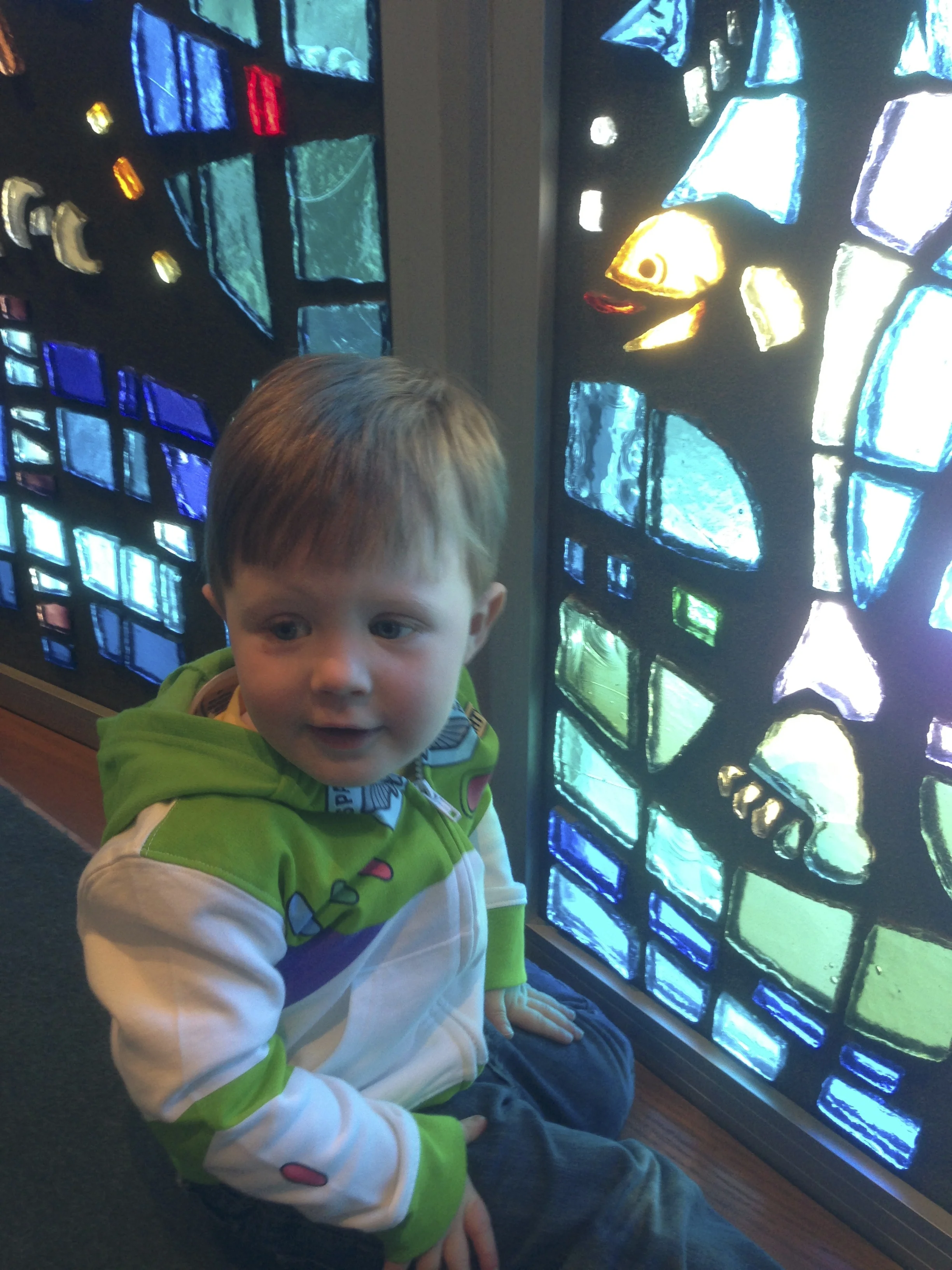 Looking at the fish when he was two and a half.