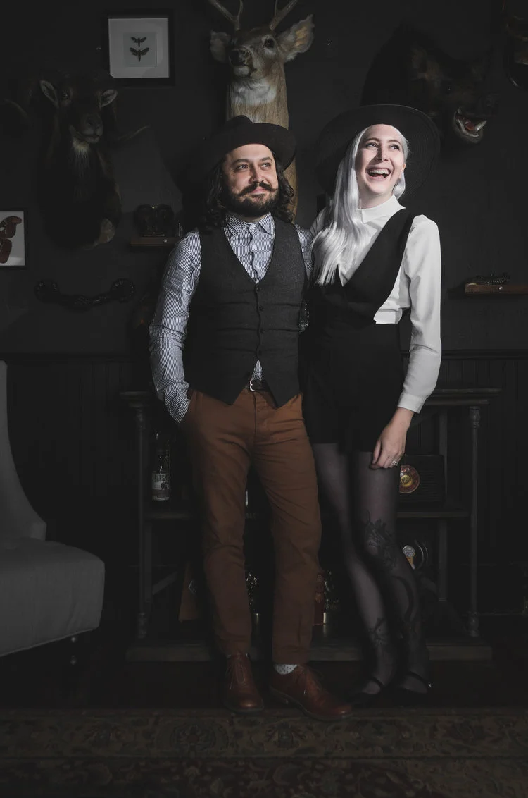 Joshua and Kayleen Harvey of The Sneerwell , Denver-based custom flask makers