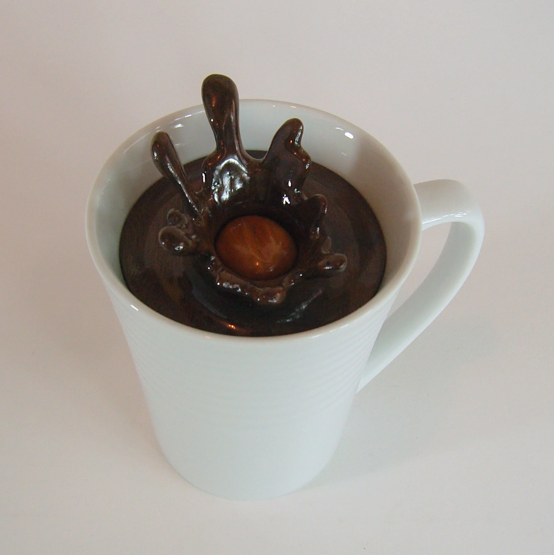Splash Series #9 5”W x 4.25”D x 5.5”H Walnut, Birch, Ceramic Cup. SOLD.