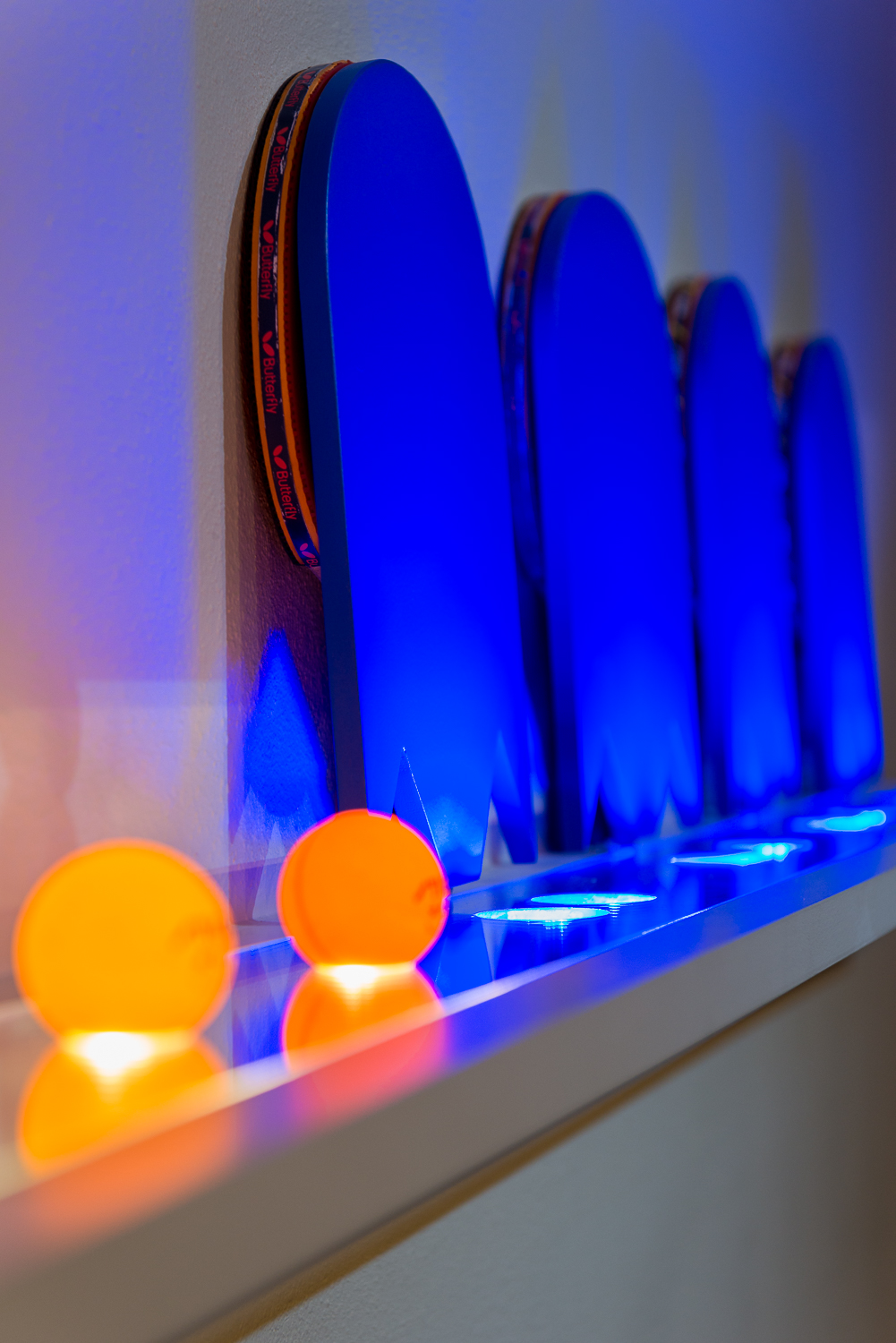 Pac-Man "ghosts" hide the paddles when they're not in use.