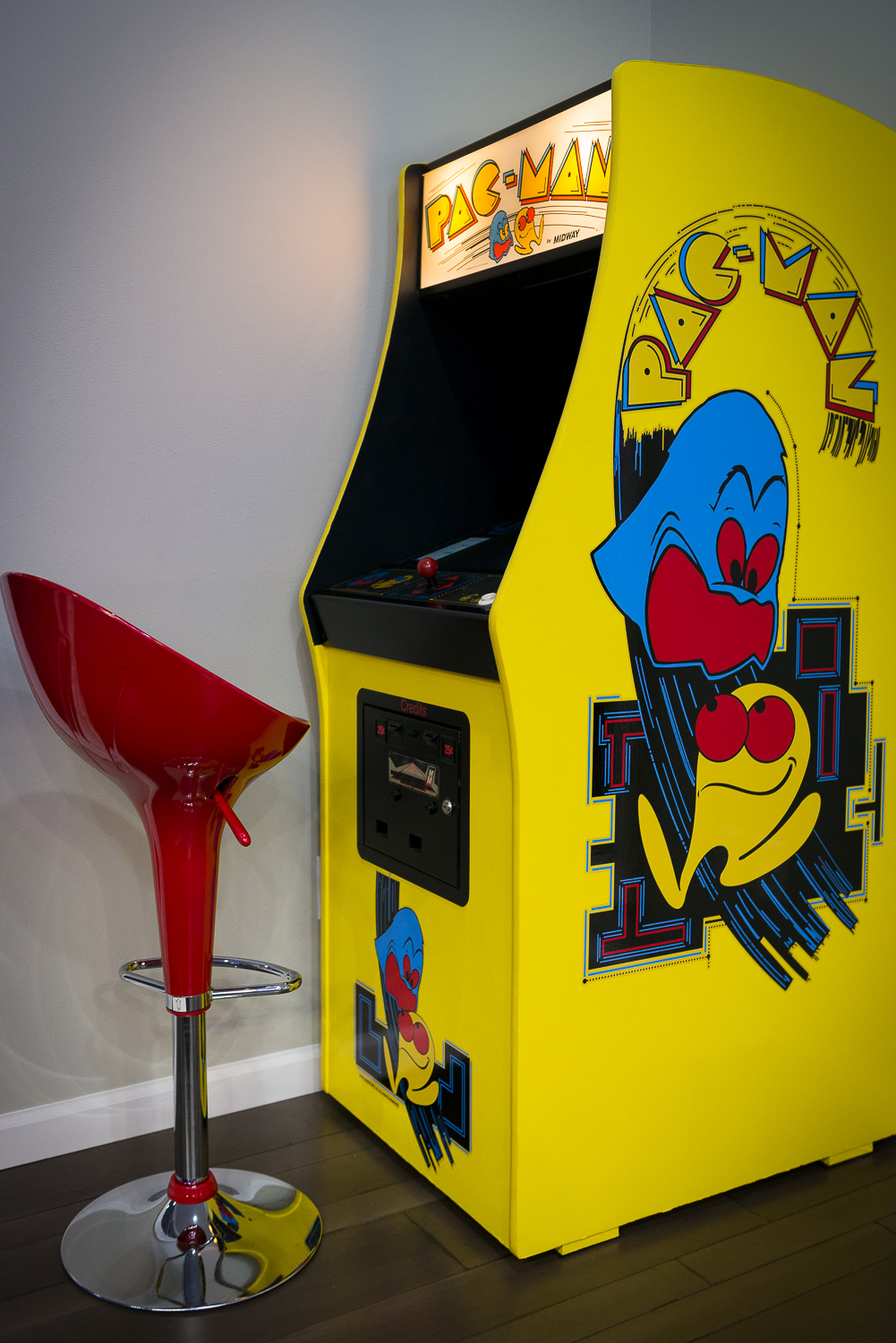 The room's vintage Midway Pac-Man machine was beautifully restored by Josh Hebert of Marlin Construction.