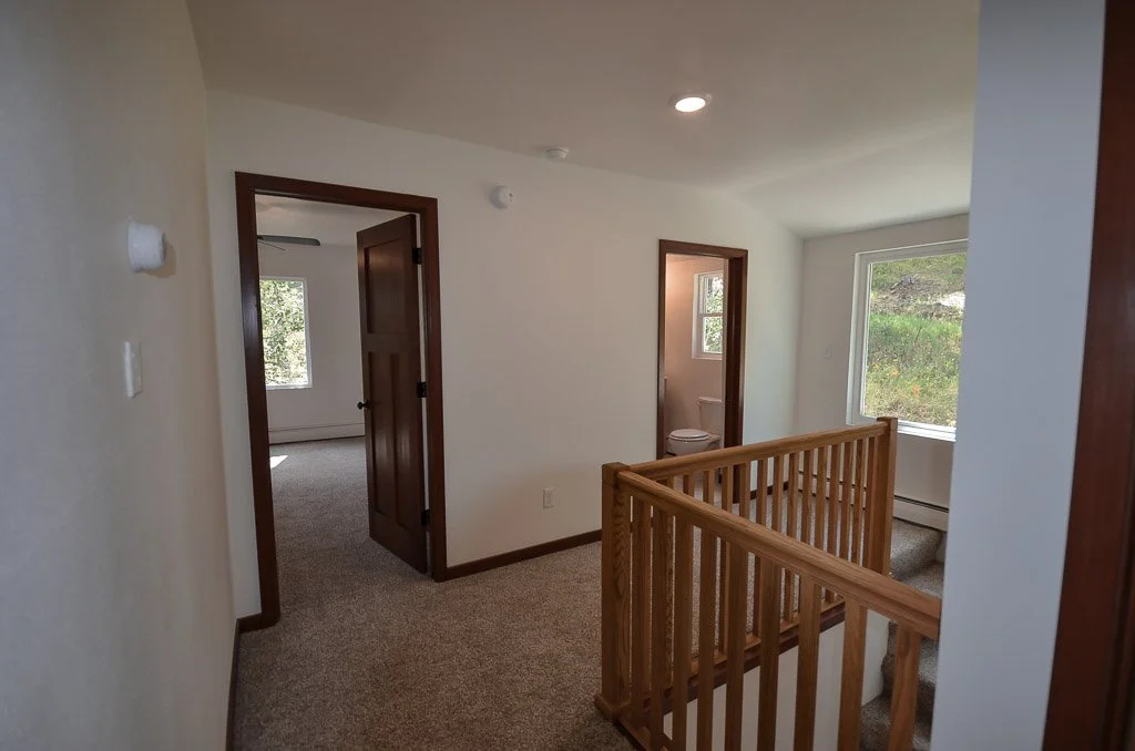 Upstairs landing, master on left and bathroom on right.