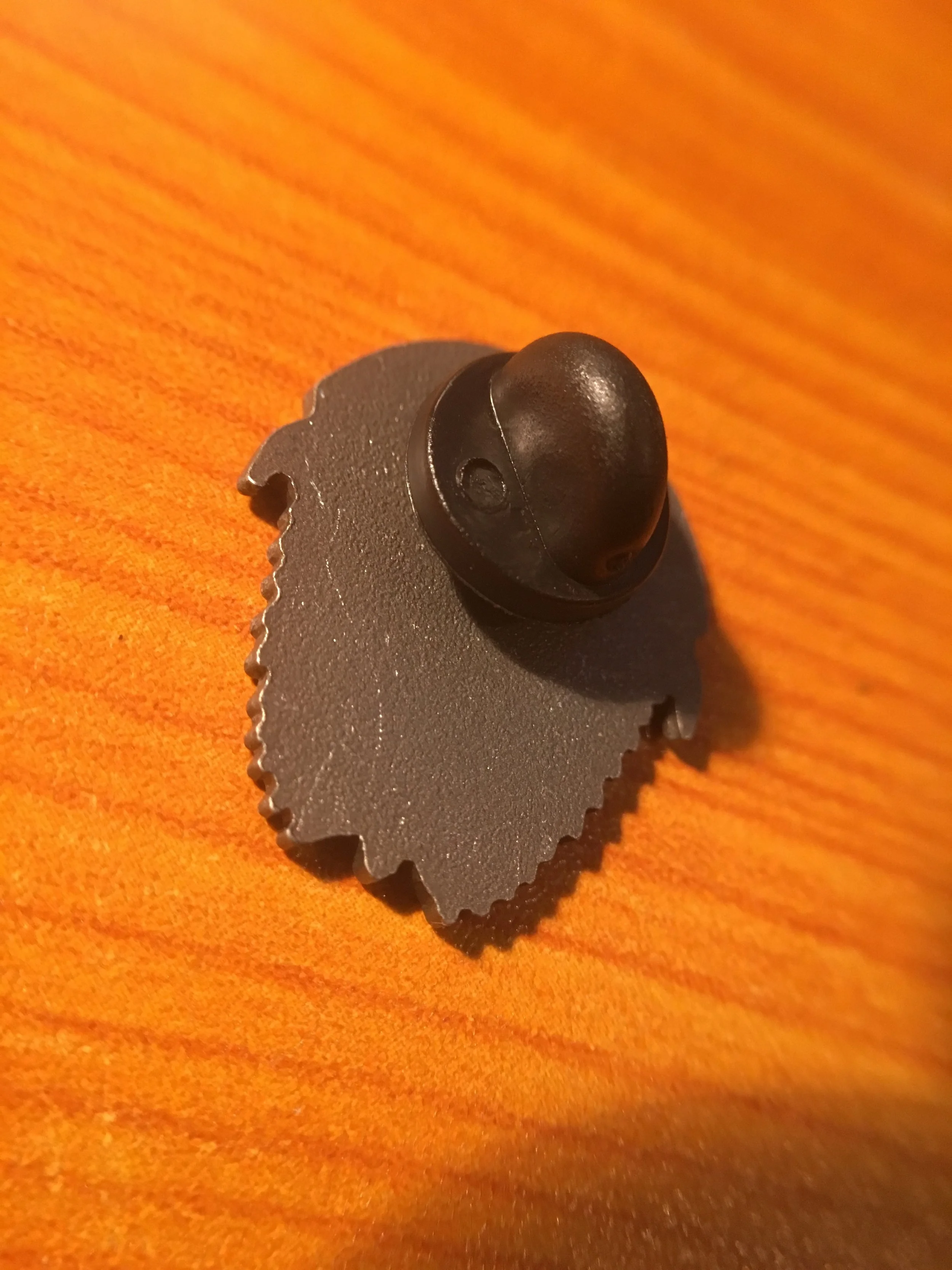 It has a rubber clasp, which are better than the metal ones. Trust me.
