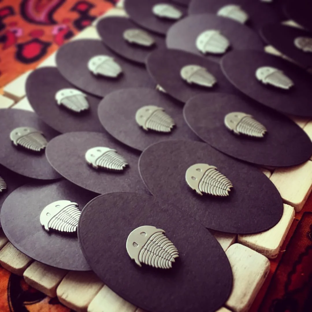 Each little Trilobite arrives on his/her own hand numbered oval backing card.