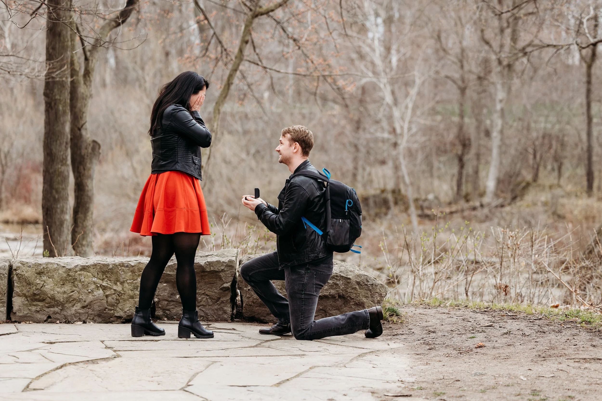 Adam and Jen's surprise proposal during the solar eclipse in Niagara Falls, NY - Photographed by Ariel Hawkins Photography