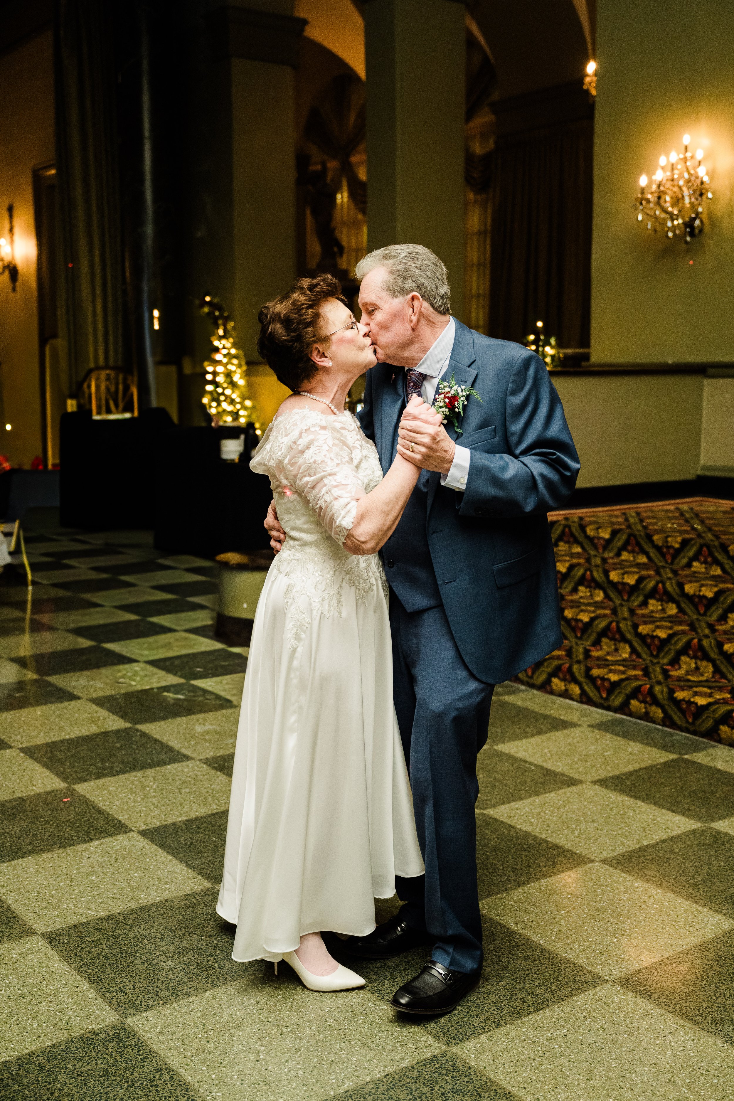 Mary Jo and Daniel Wed at Blessed Sacrament Church and The Statler in Buffalo, NY - Photographed by Ariel Hawkins Photography