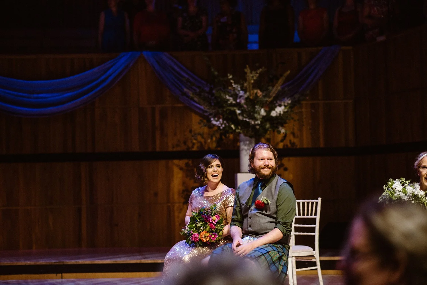 couple on stage mass wedding london