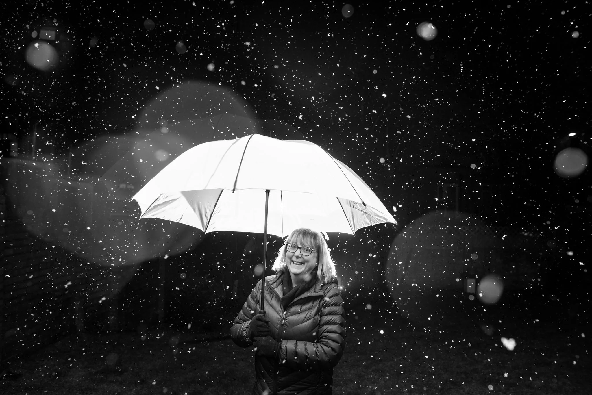 "Last January I was getting to grips with and improving my off camera flash so when I saw it was snowing I grabbed my camera, speedlight and triggers and the closest person (mum) and did this super quick shot. I love the snow flakes, the droplets on the lens doing lovely bokeh stuff, but mostly I love her beaming smile - ever supportive, ever proud. I wouldn't be where I am today without her and my dad. They're awesome and I love them" Elyse Marks