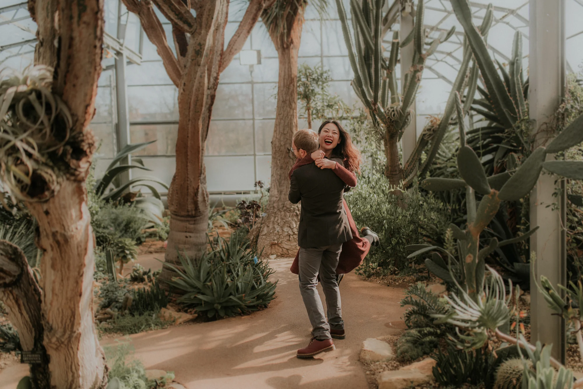 Engaged couple hugging