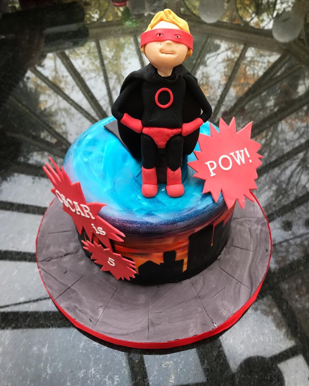 Personalised superhero cake