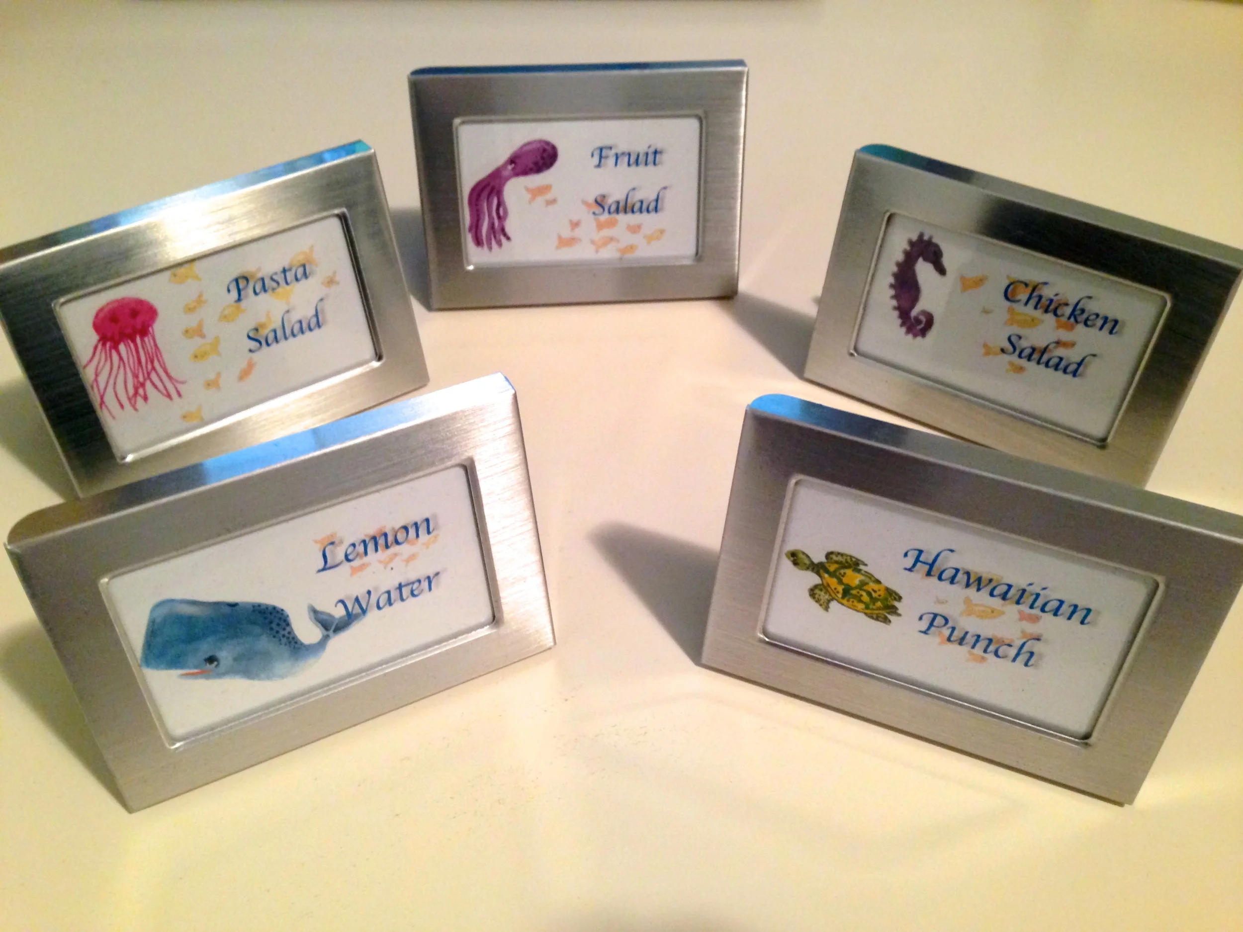 Create your own unique food and beverage labels using Dollar Tree frames, clip art and card stock. 
