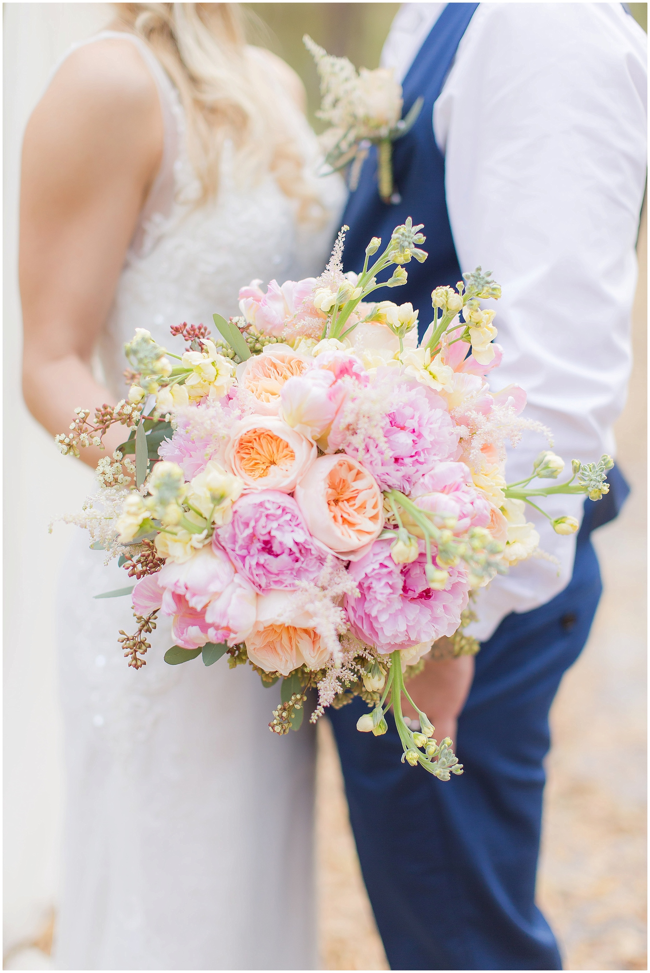 Brides bouquet from Julia's Flowers in Rustic Spring Wedding. 