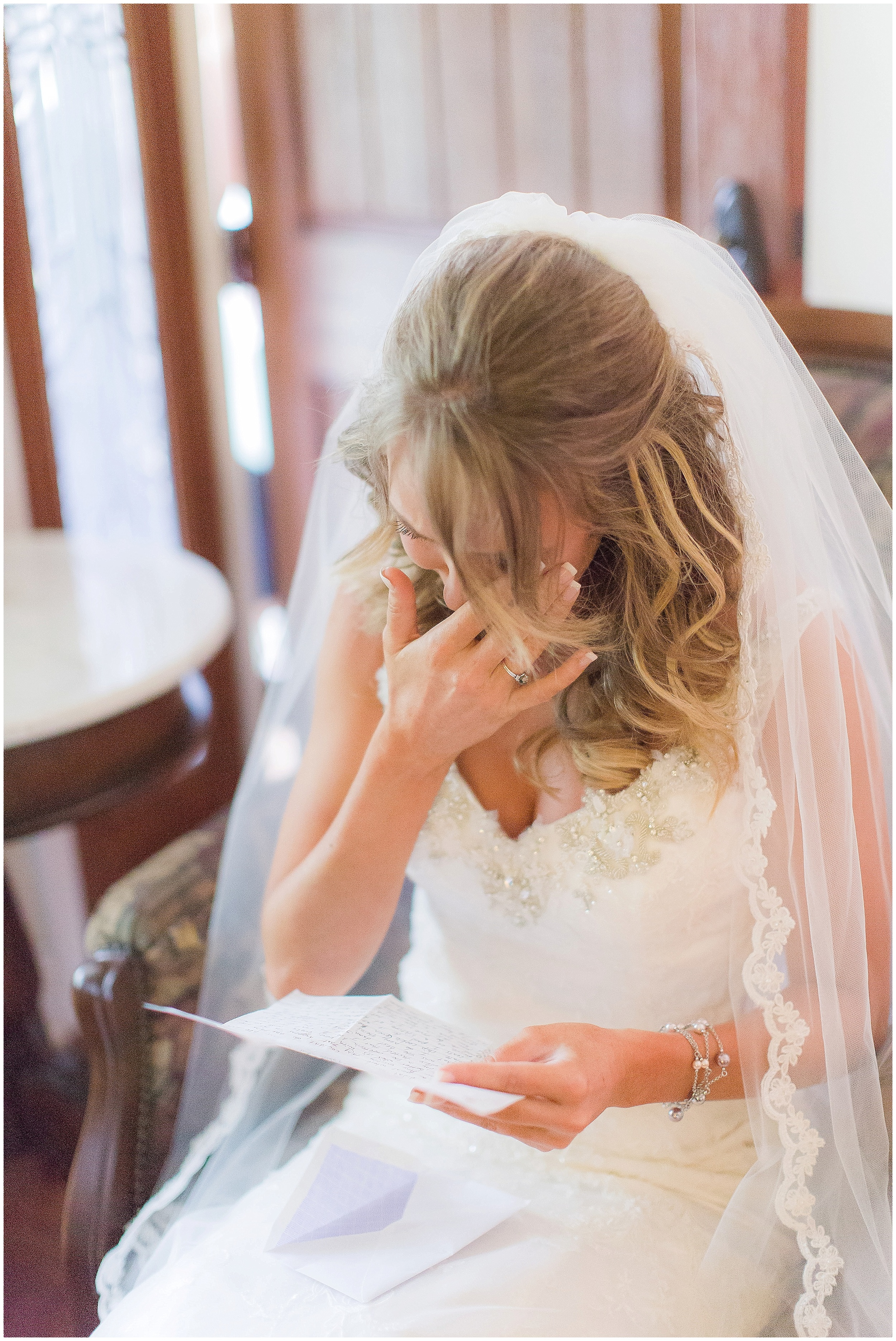 Bride Reading Romantic Handwritten Vows from Groom before Ceremony. 