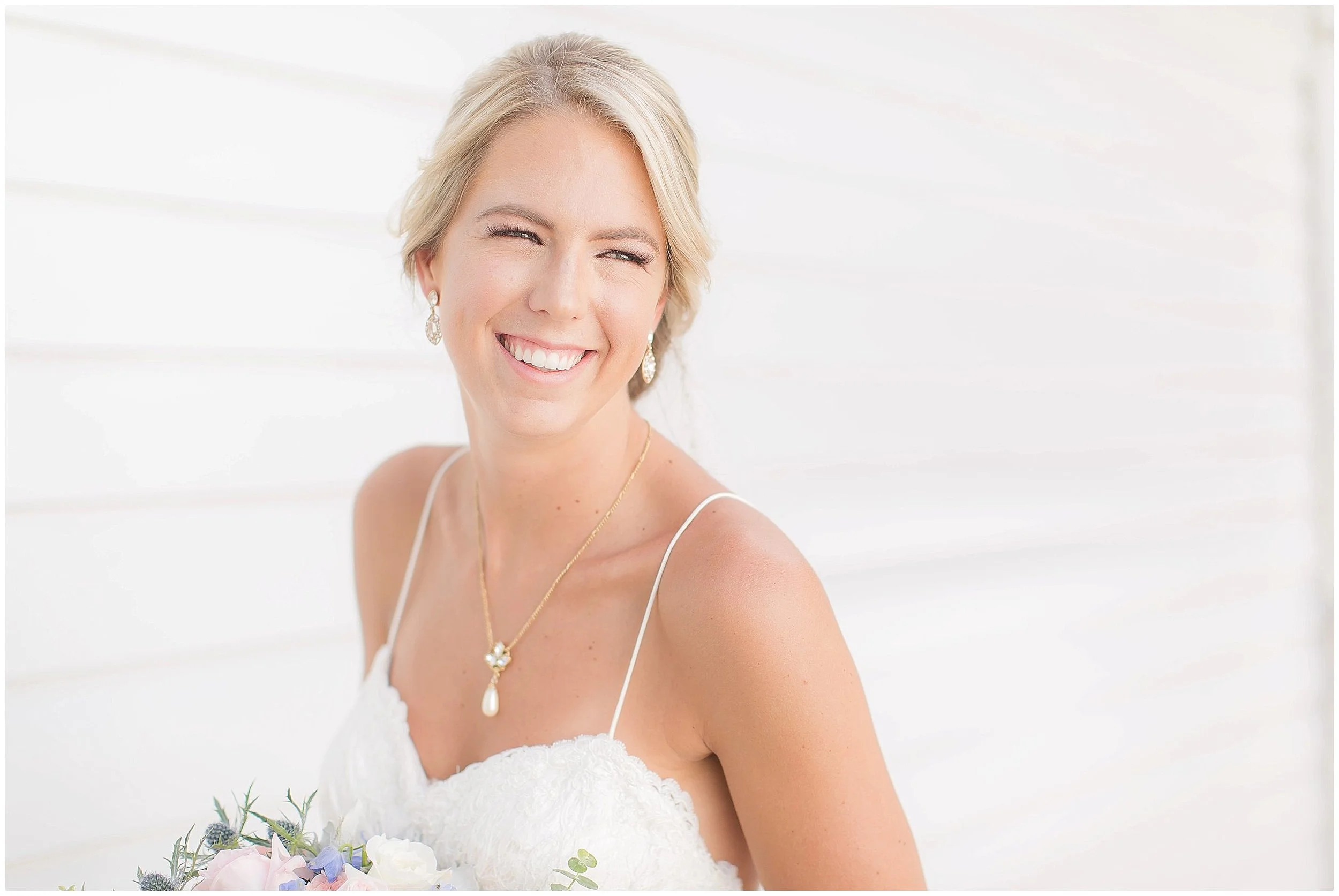 Classic bridal portraits with summer gown and low bun