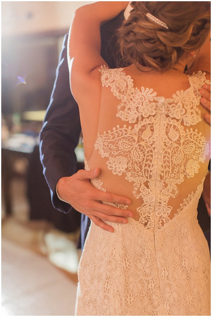 That Dress Back!  Love the lace of this BHLDN wedding gown during their first dance.