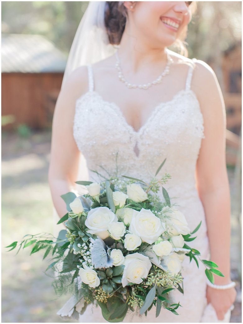 Lush Greenery Bridal Bouquet with White Roses Italian Ruscus and Dusty Millers 