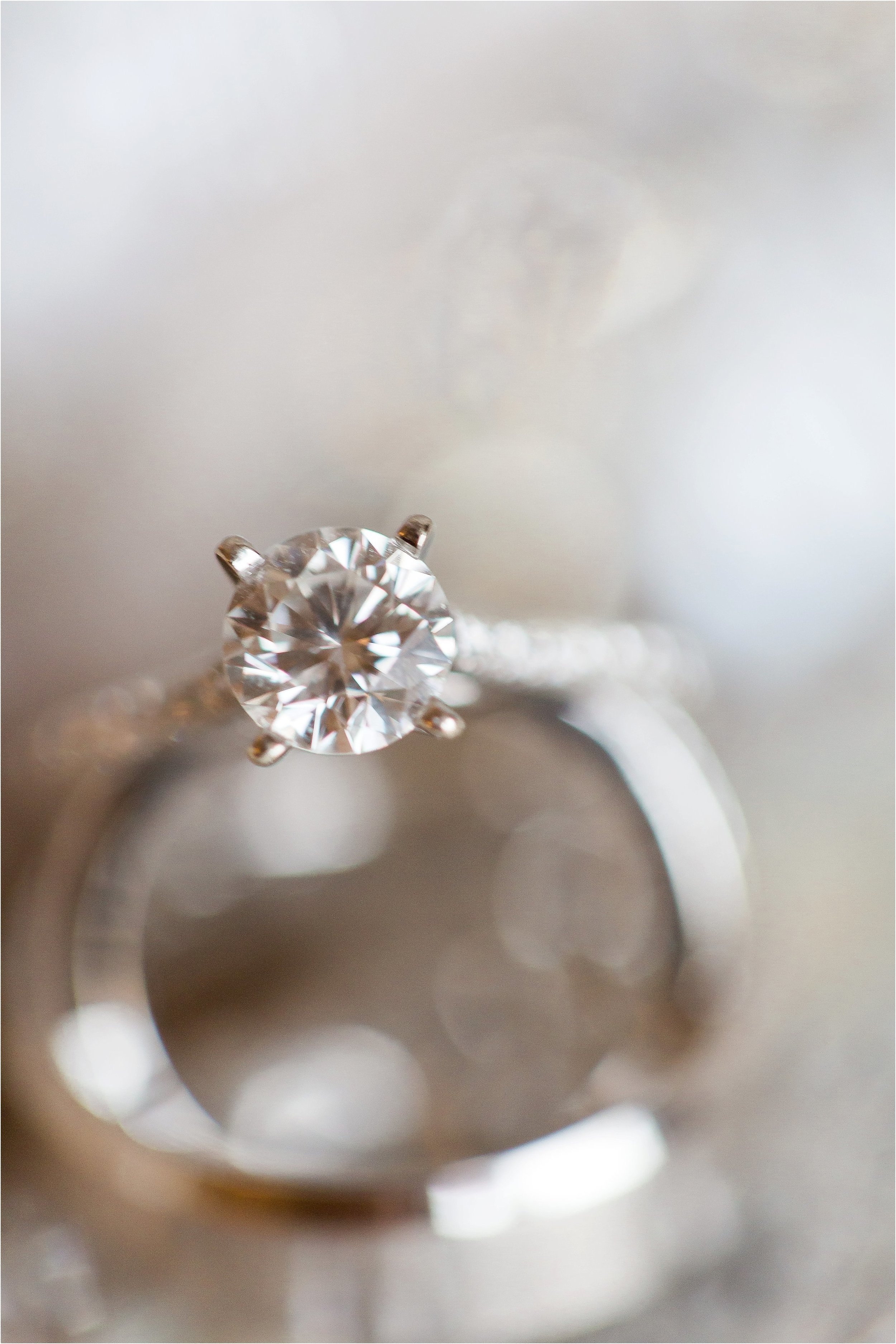 Solitaire diamond setting and platinum wedding bands at Wyndham Grand Resort at Bonnet Creek Wedding by PSJ Photography 