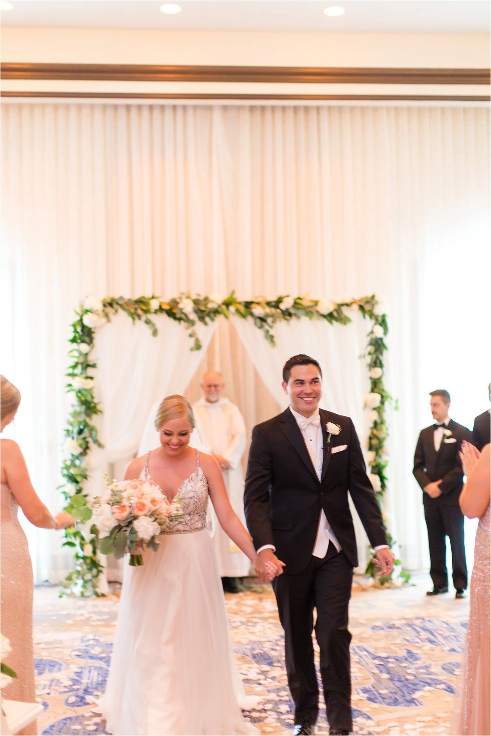 Indoor Ceremony at Wyndham Grand Resort at Bonnet Creek wedding by PSJ Photography 