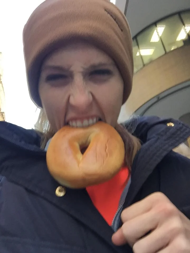 I thought an obnoxious picture of me eating a bagel would be good here! HA! Why a bagel? Because I had a long run and it has 60g C NOT because bagels are "good or bad" for you!