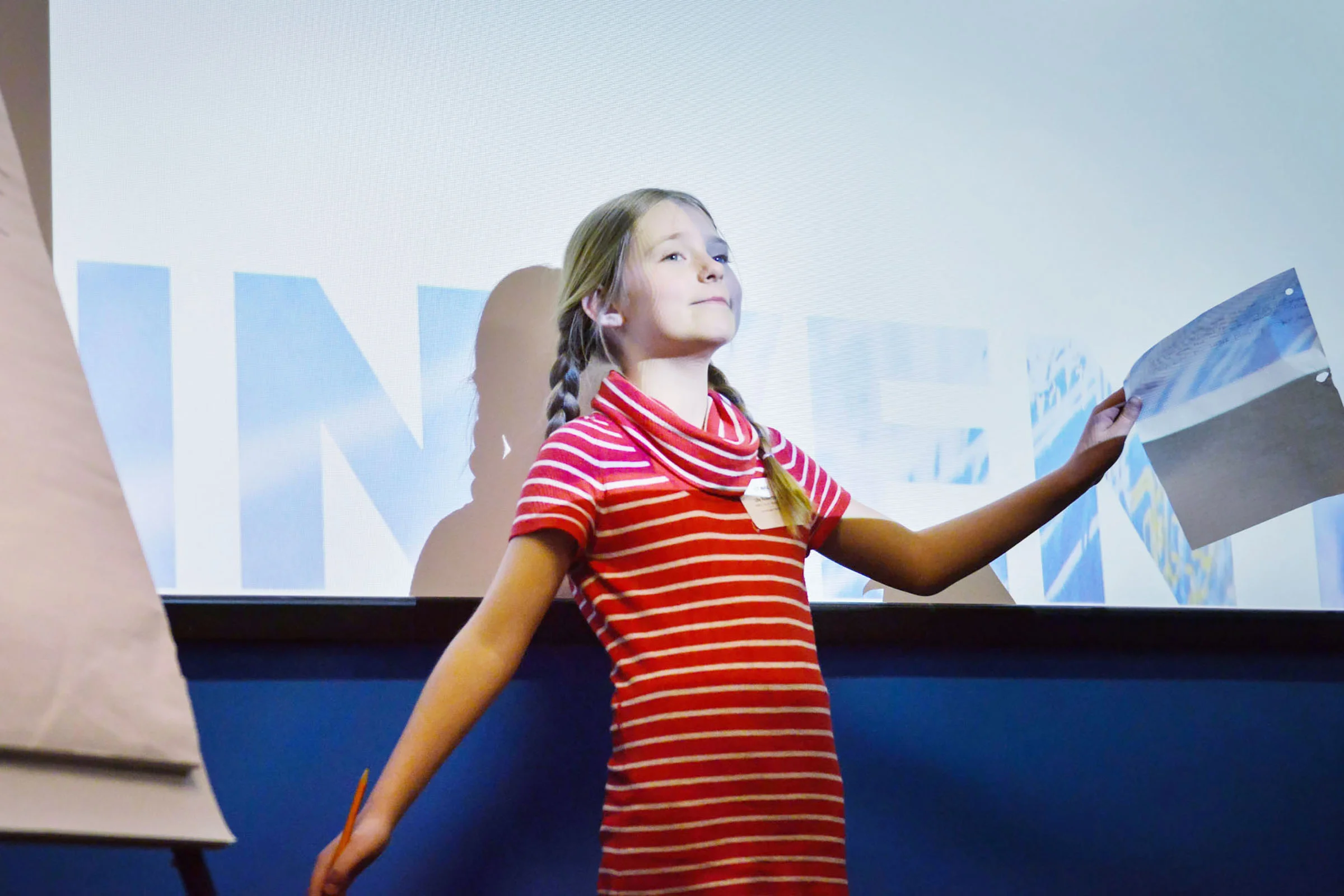 A student reads her adventure story at the 2015 MASC Young Authors & Illustrators Conference in Ottawa, Ontario.