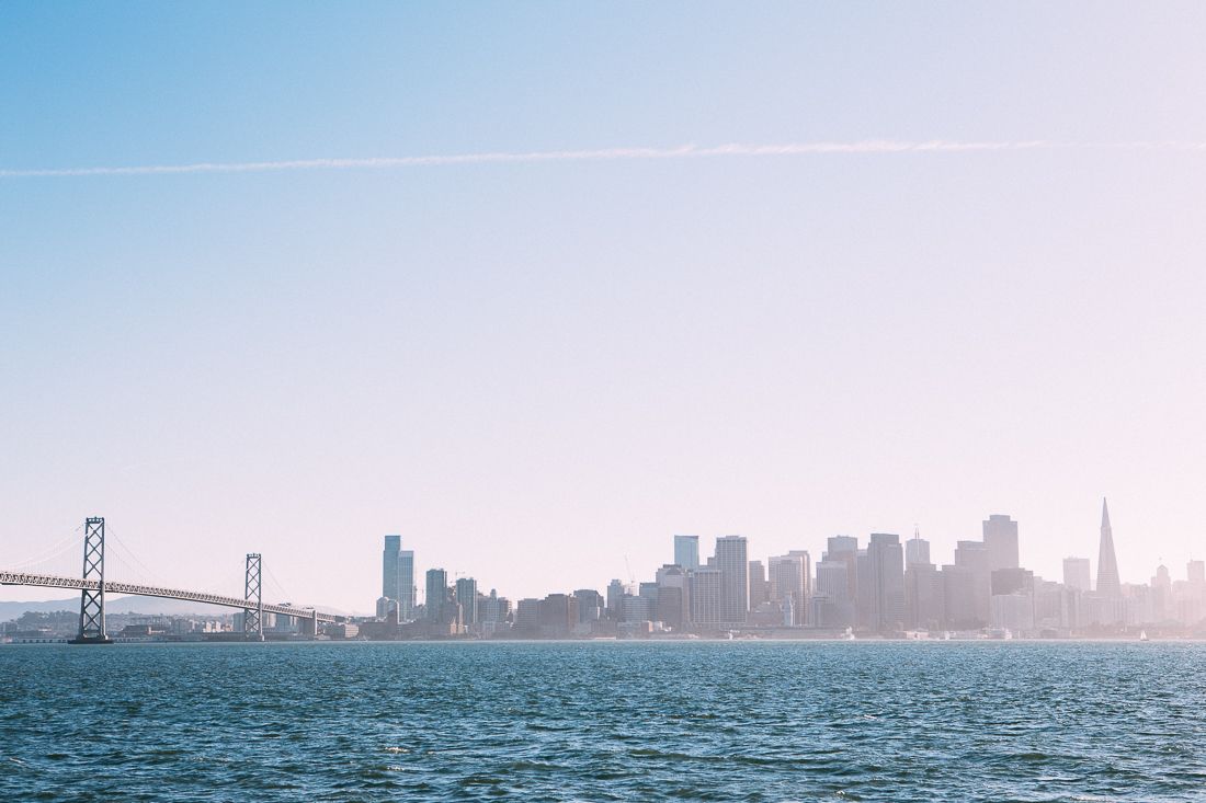The beautiful Bay Bridge and scenic city skyline, as seen from Treasure Island. 