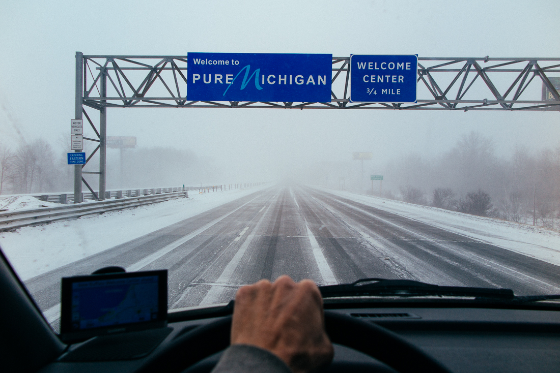 Day 79 / Mile 9240. I hit a pure Michigan blizzard going North. The streets were cold and slick, but my coffee was hot for hours thanks to my Stanley thermos.