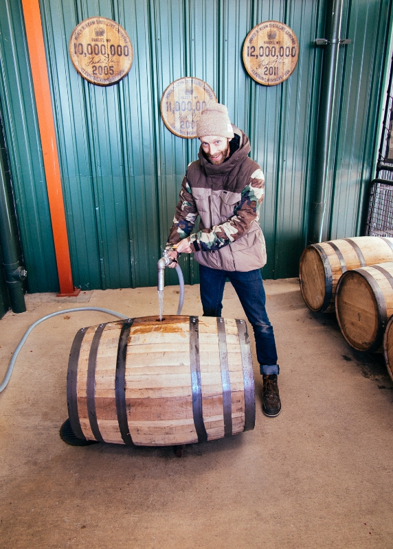 Here I'm pouring fresh bourbon into a cask to be aged. Yeah I took a taste, and it needs a few years until I'm ready for it. 