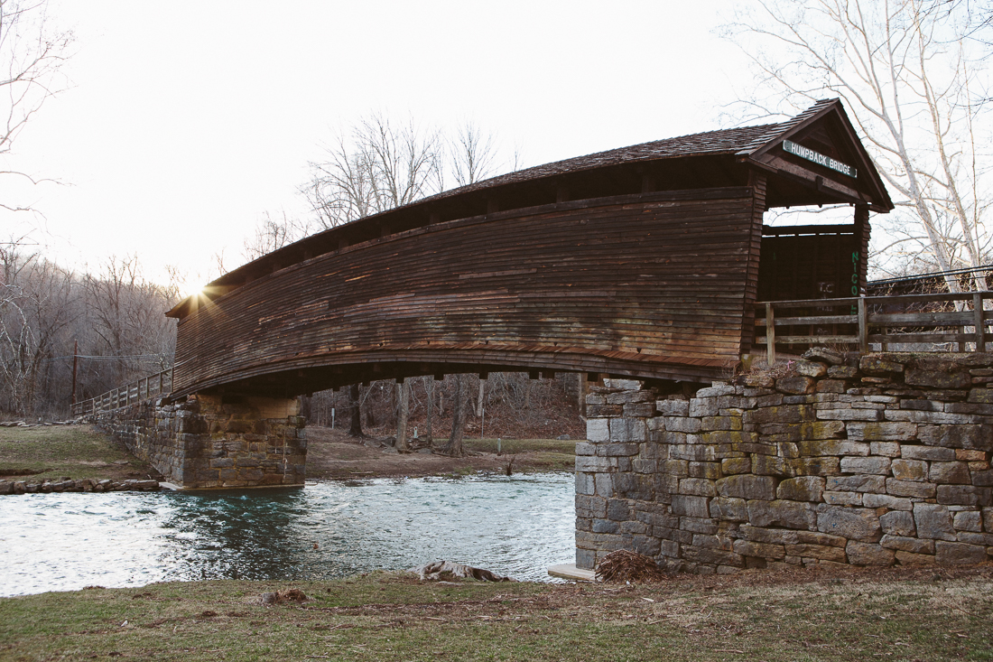 Covered bridges are plentiful on the East Coast, but this is one of a few remaining "humpbacks" that rise in the center.