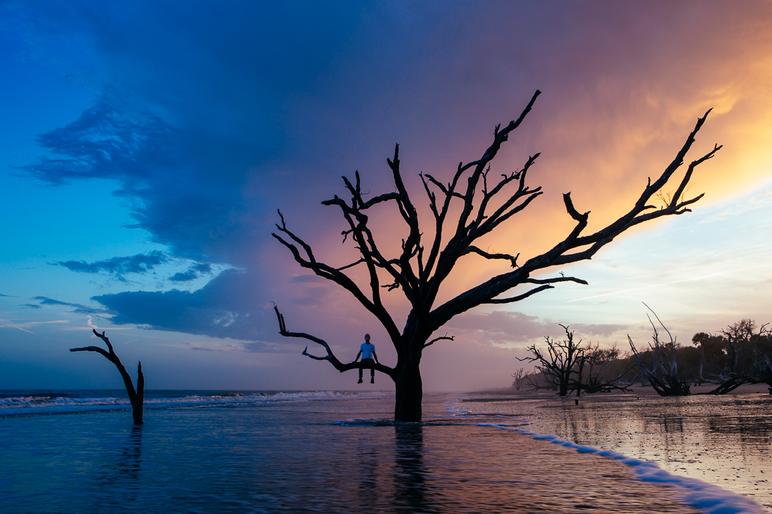 The tide and waves came above my camera and tree that I climbed. The water stranded me, but made the best sunset photo I've ever shot. 