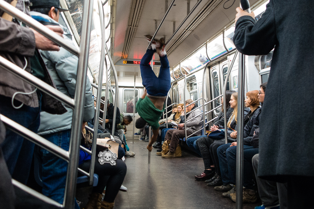 People are always hustling in the city. There are classic panhandlers and then there are performers... this dude had a gymnastic routine on the L train. 