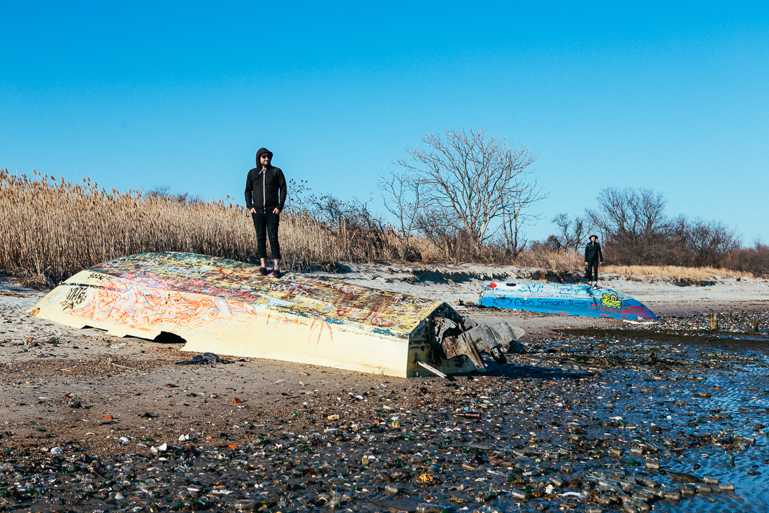 Hurricane Sandy wrecked shop here. These boats are still just sitting here as a canvas for graffiti artists in training.