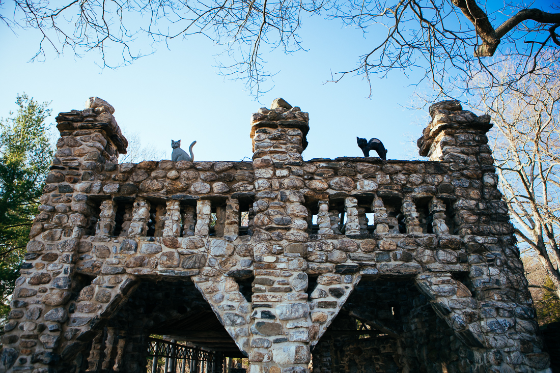 This structure was a picnic shelter, complete with cat statues.