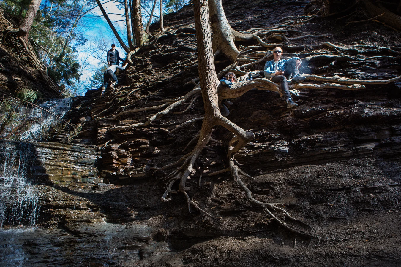 In Chestnut Ridge Park is a bizarre natural phenomenon, the Eternal Flame Falls. There's a small cave behind the water that emits natural gas and can be lit on fire. ...there was also a bizarre group lurking on the cliffside. 