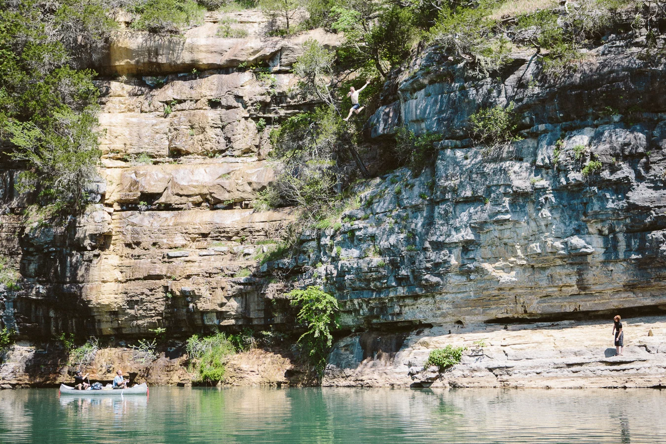 I parked my van down by the river, and showed up just in time to watch this cliff jump.