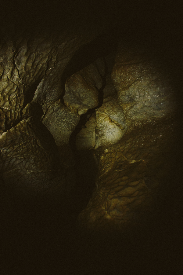 I wasn't expecting the level of spelunking required to get to the prized spot 200' back in the cave. I had to take my pack off and squeeze sideways through these extremely tight walls, and luckily I alway have a headlamp since there is zero natural light in here as well.