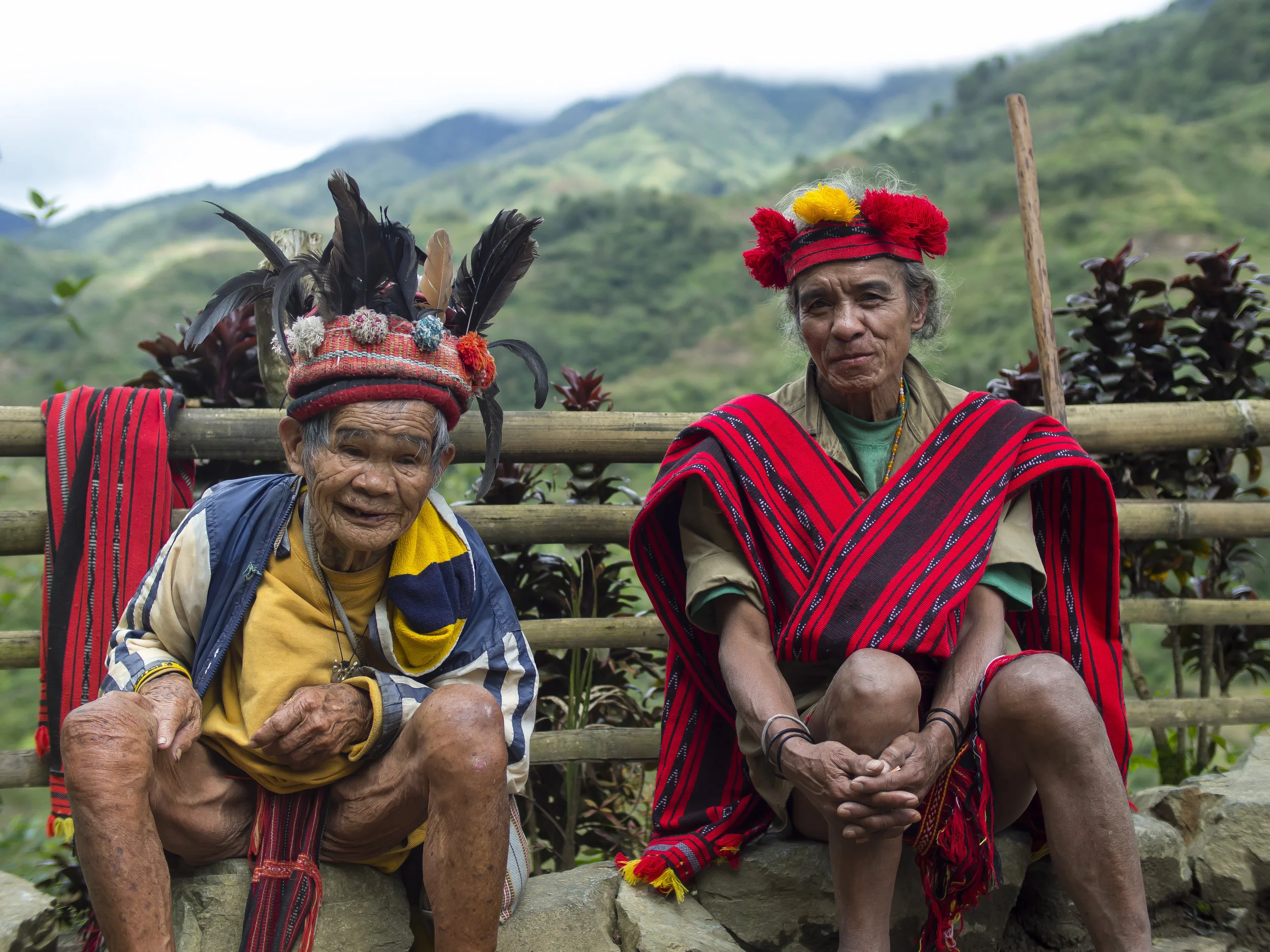 Two old men in traditional clothing. Banue, Philippines.
