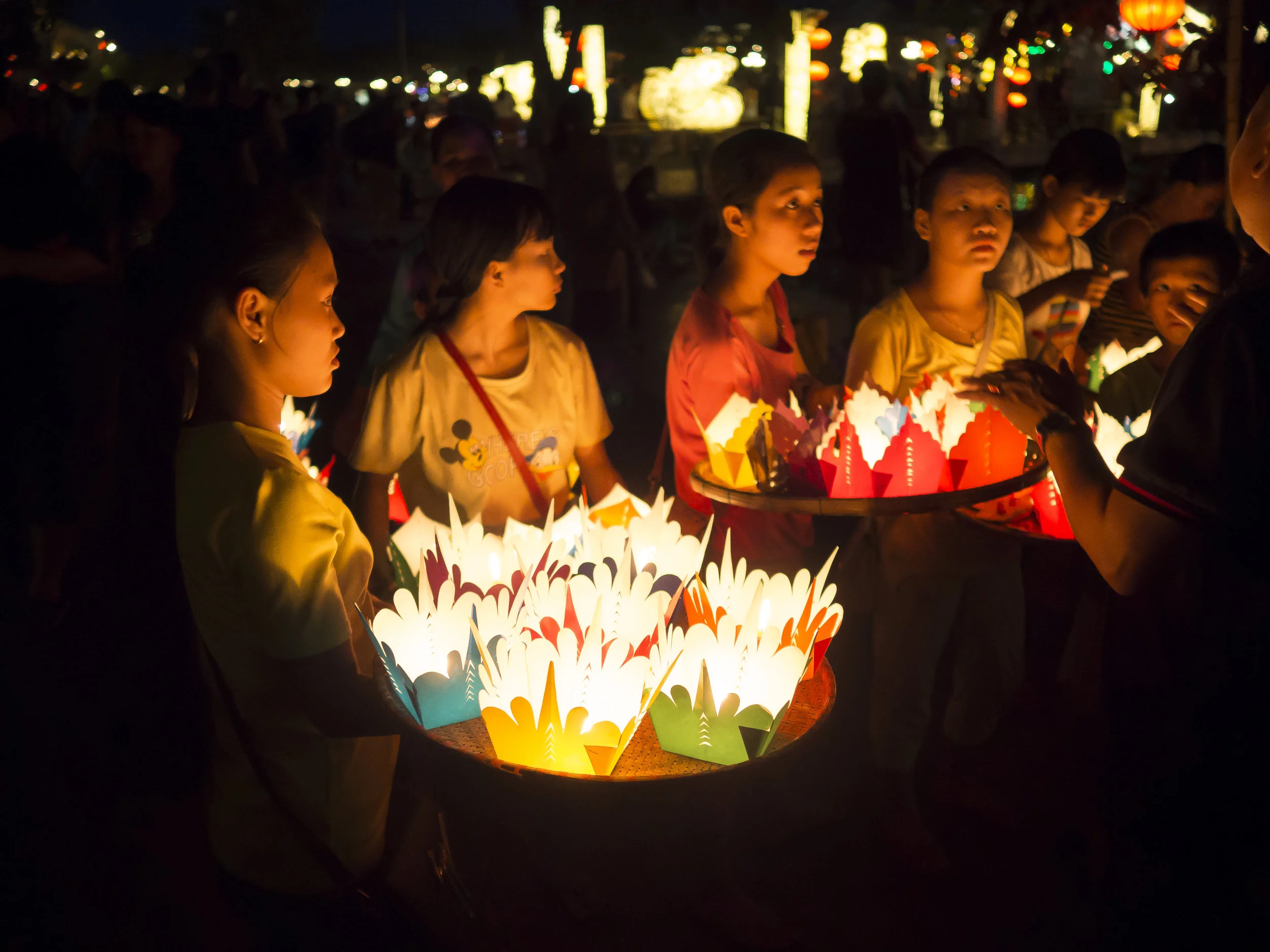 Young girls with lanterns. Hoi An, Vietnam.