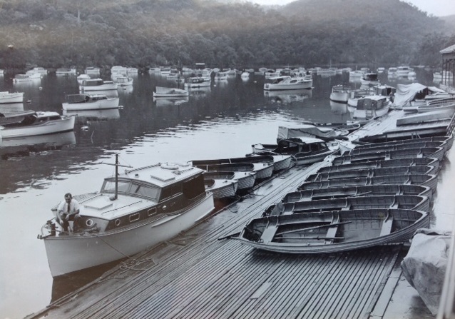 Bobbin Head. 1949. Carl Halvorsen at the bow of a LH-G a Standard 25' Hire Cruiser.