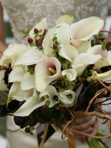Bride Karina Fall Wedding 2007 So beautiful! I still cherish the photos of my flowers from our wedding. I remember seeing them for the first time that day and tearing up, afraid I would mess up my make-up. I can't believe it's going be ten years this fall! I remember it being 107 degrees in Pasadena that day, but somehow you were able to keep the flowers looking so fresh and from wilting. You took my favorite flowers (calla lilies, curly willow branch, and coffee bean--a nod to my husband's love of coffee) and brought it all together beautifully! Even my sister and mom still have their dried bouquets. You wouldn't think they would keep them, but I guess the day itself carried so much sentiment with it, that they wanted to hold on to something meaningful and tangible. Your flowers did that beautifully!