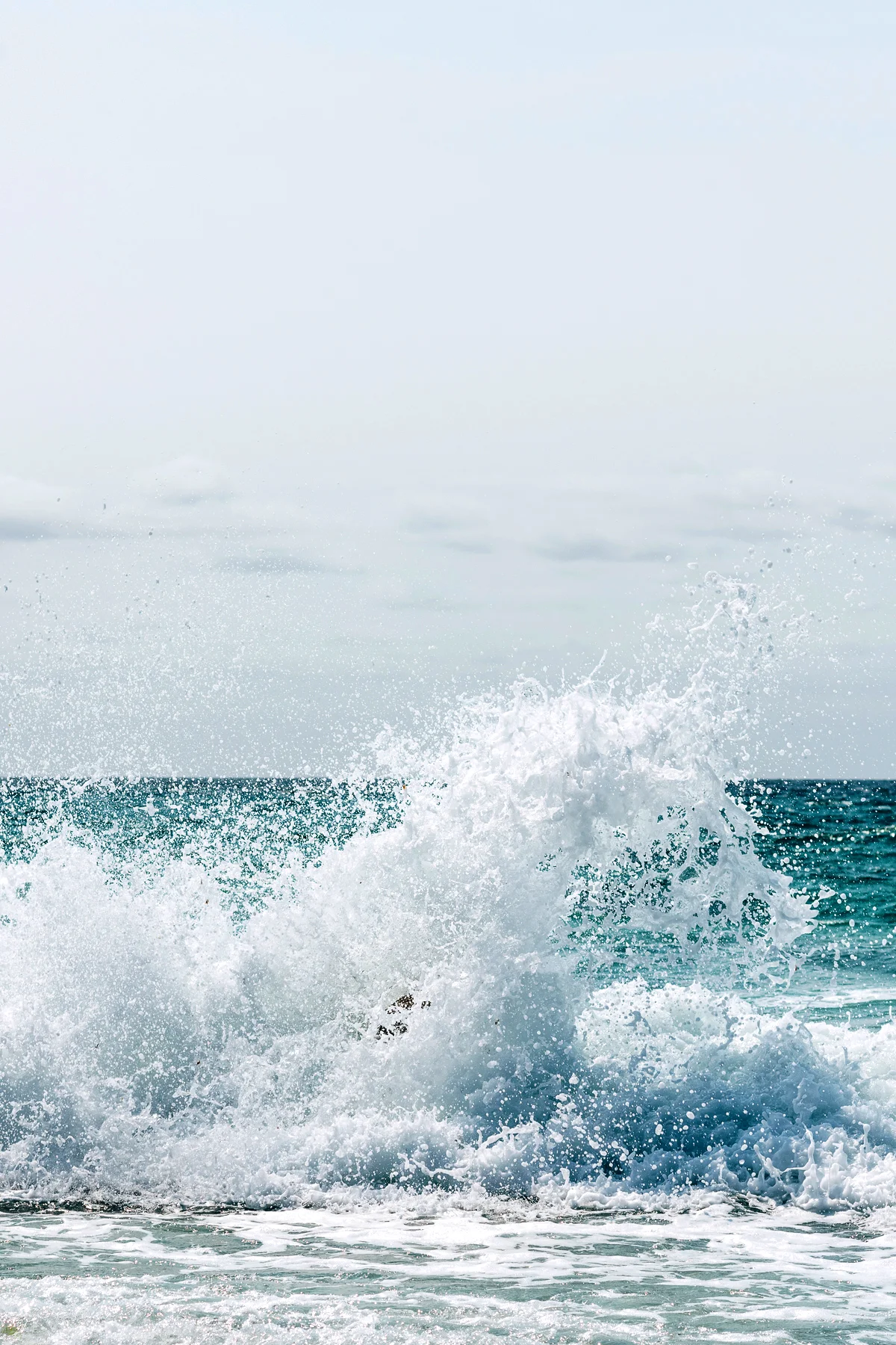 Travel documentary editorial food portrait photography. Shot on location in Wine Glass Bay, Freycinet, Tasmania, Australia. Feature for Etihad inflight magazine, Atlas. Featuring ocean wave