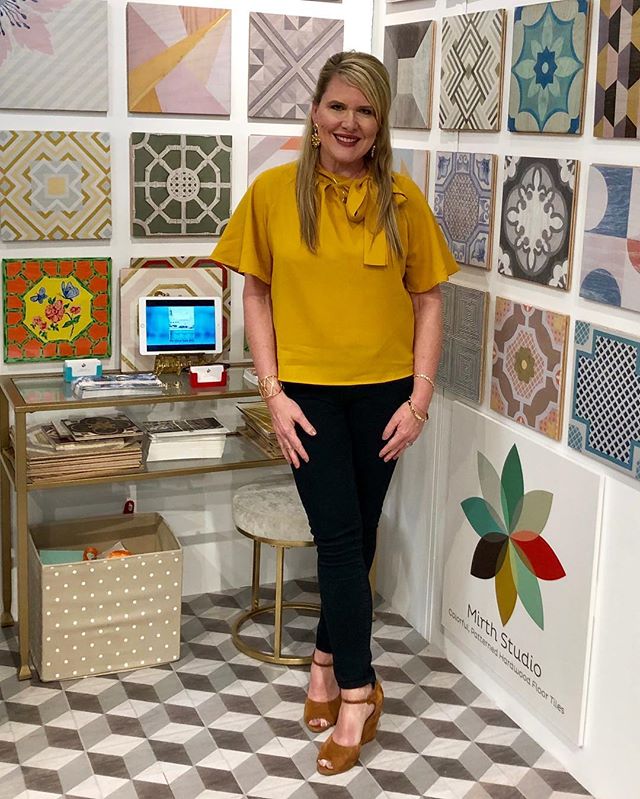Day 4 of High Point Market and I&rsquo;m still standing! here I am modeling my new earrings that I will go home with from @addisonweeks and might have to buy some of their gorgeous hardware too! We are are featuring our Calhoun pattern Hardwood floor