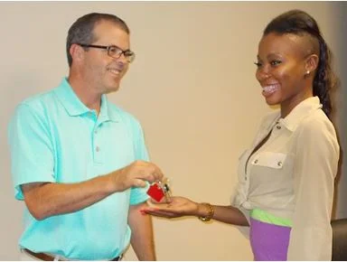 Pauletta Carson receives her new housekey