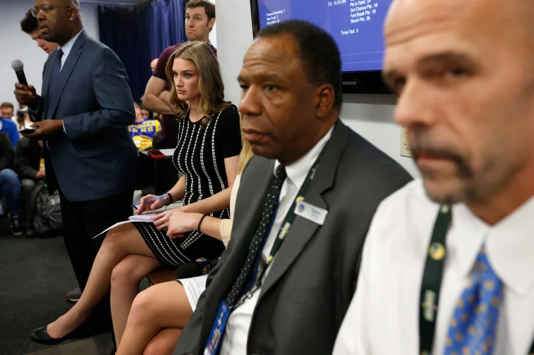 NBC Sports Bay Area sideline reporter Kerith Burke, left, listens to head coach Steve Kerr speak during a press conference after the Golden State Warriors defeated the Memphis Grizzlies 97-84 during their NBA game at Oracle Arena in Oakland, Calif., on Wednesday, Dec. 20, 2017. Burke replaced Rosalyn Gold-Onwude, the former Stanford basketball standout who left NBC to accept a full-time NBA position with Turner Sports. (Jane Tyska/Bay Area News Group)