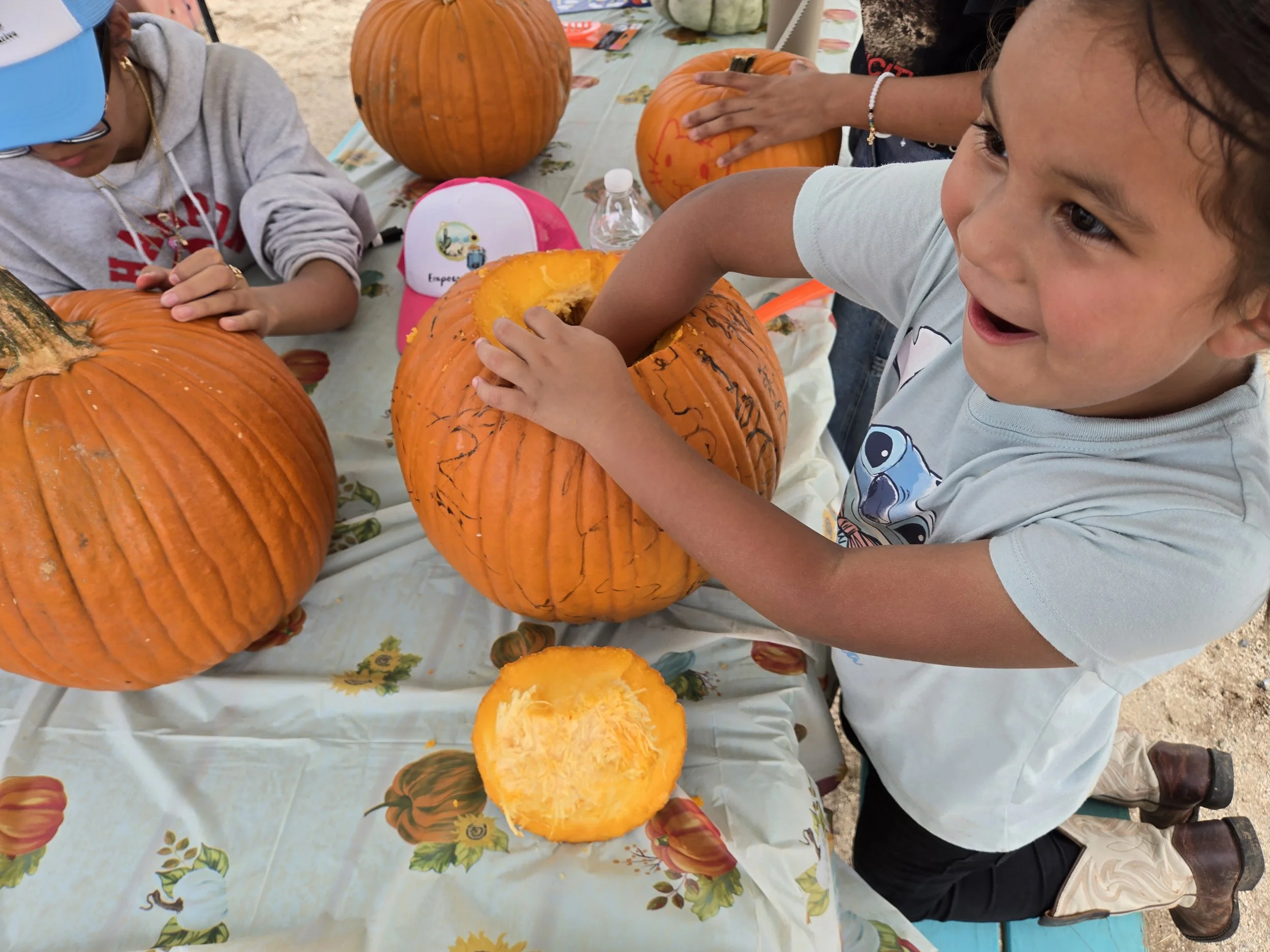2025 fall camp pumpkin carving.jpg